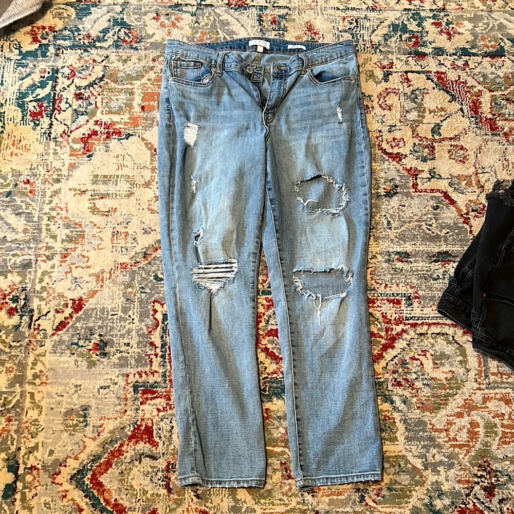 women’s distressed light wash jeans